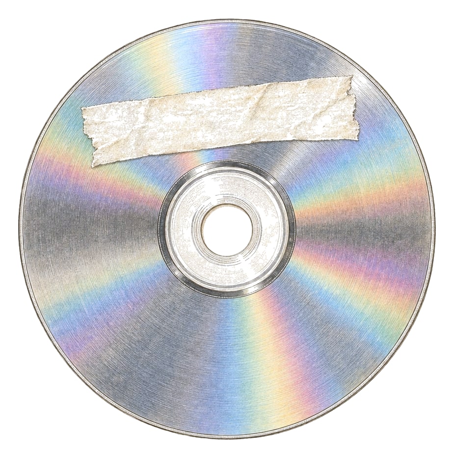 A compact disc with a strip of masking tape for a label